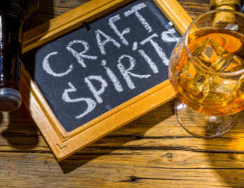 image of craft beer and spirits in a glass with a sign that says craft spirits.