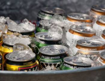 Image of beers at event on ice in a cooler