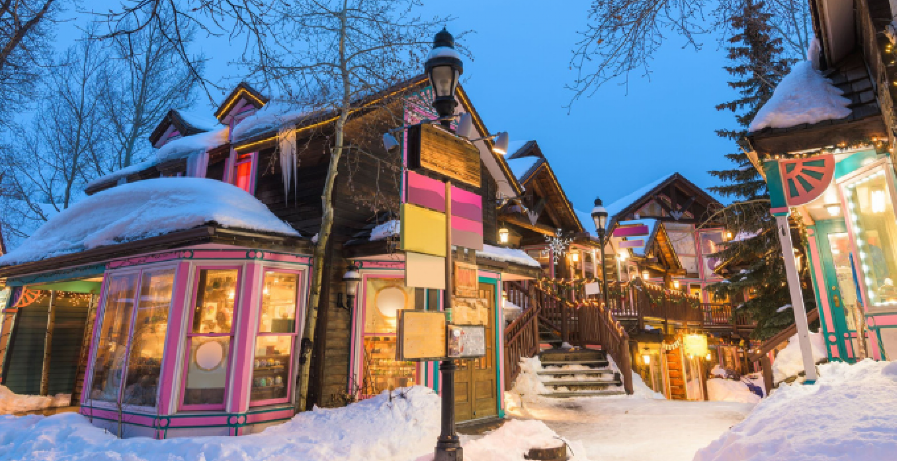 downtown Breckenridge businesses on a snowy evening