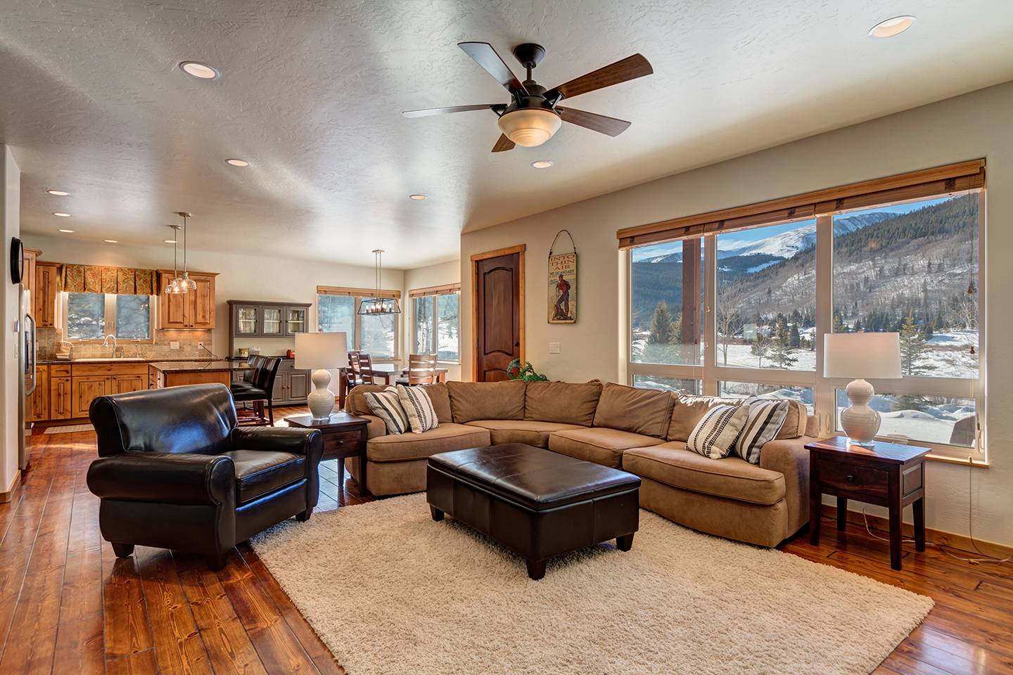 Living room furnishings and window views at Aspen View Retreat.
